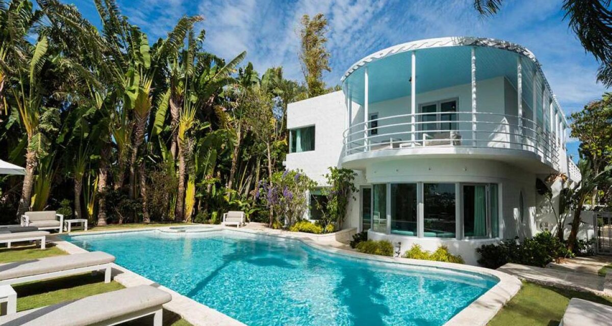 Paradise outside house with hurricane windows